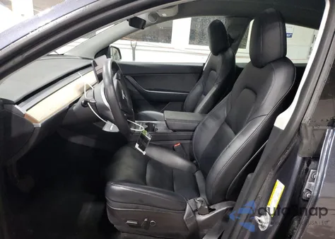 2022 Tesla Model Y из США, поврежденный, VIN 7SAYGDEE1NF441500